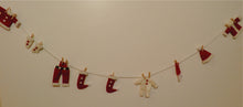 Load image into Gallery viewer, 47123-00 Garland with Santa Clothes, 55&quot; Long